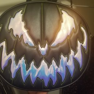 ON HOLD Love Pain and Stitches Iridescent purse